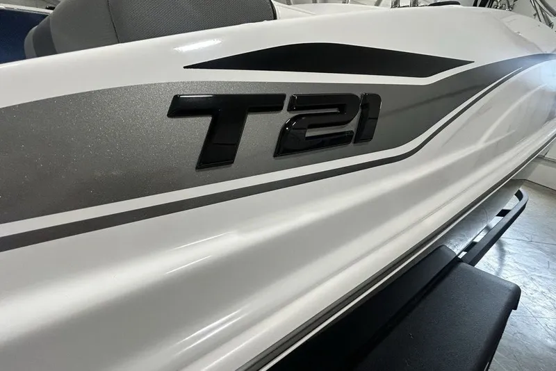 Slide: The Image of 2026 Tahoe T21 boat with sleek design and modern graphics. - 4