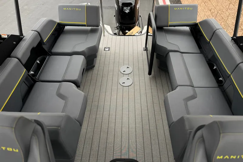 Slide: The Image of Interior of 2025 Manitou EXPLORE 24 boat with sleek seating and modern design. - 14