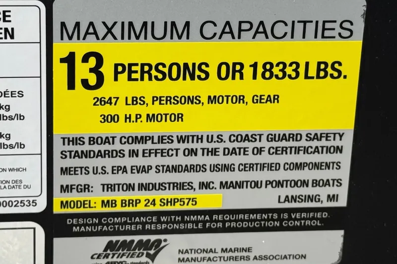 Slide: The Image of Capacity label for 2025 Manitou EXPLORE 24, 13 persons or 1833 lbs, 300 HP motor. - 29