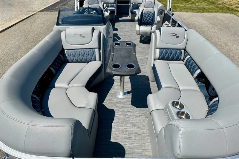 Slide: The Image of 2023 Bennington 23 LX STERN RADIUS pontoon boat with luxurious seating and modern design. - 18