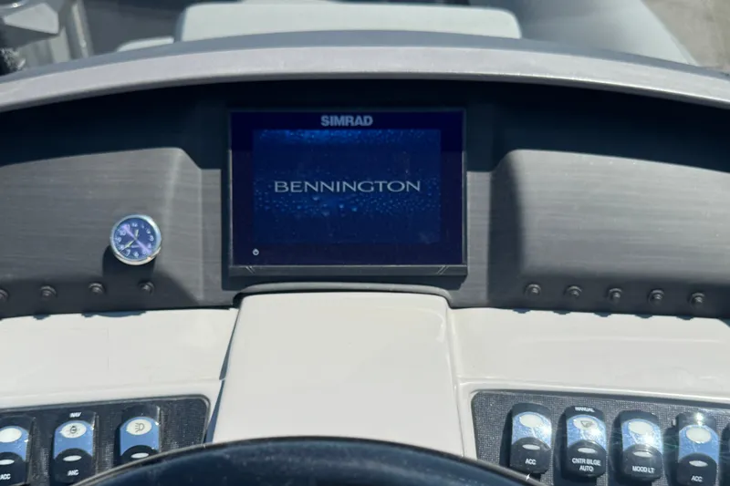 Slide: The Image of Dashboard of 2023 Bennington 23 LX STERN RADIUS with Simrad display and controls. - 13