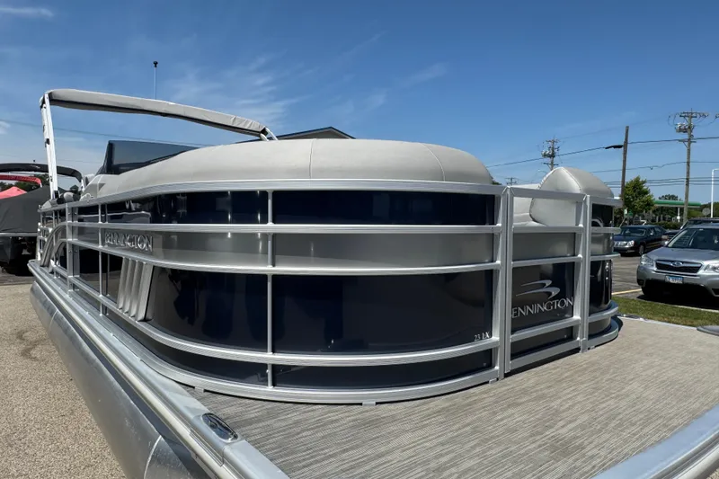 Slide: The Image of 2023 Bennington 23 LX STERN RADIUS pontoon boat with sleek design and modern features. - 26