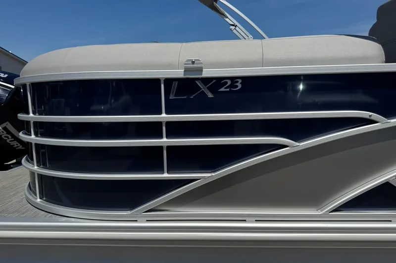 Slide: The Image of 2023 Bennington 23 LX STERN RADIUS pontoon boat with sleek design and modern features. - 25
