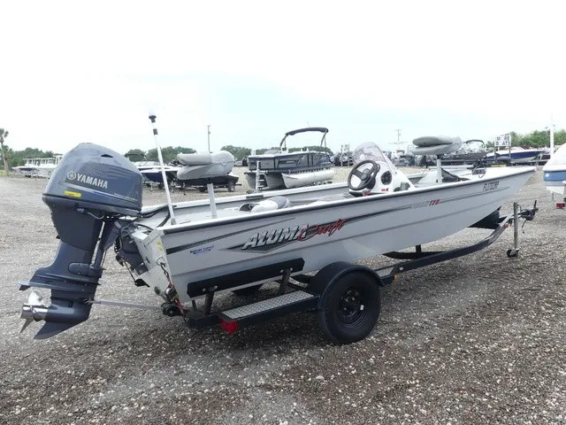 Slide: The Image of A 2018 Alumacraft 175 PROWLER boat with a Yamaha outboard motor on a trailer. - 5