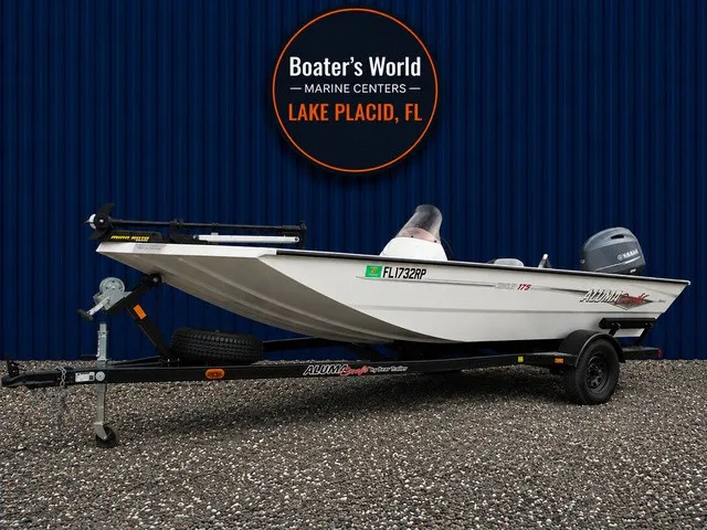 The Image of 2018 Alumacraft 175 PROWLER on a trailer, parked in front of a blue building. - 1