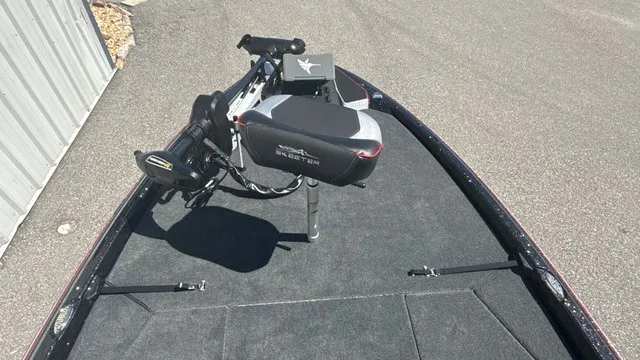 Slide: The Image of The image shows the bow deck of a 2027 Skeeter ZXE21 boat with a mounted seat. - 9