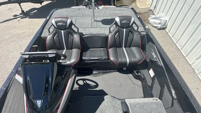 Slide: The Image of The image shows the cockpit of a Skeeter ZXE21 boat with two black seats. - 11