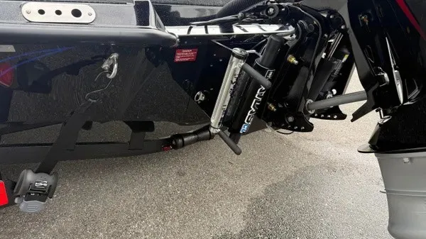 Slide: The Image of Close-up of the stern of a Phoenix 921 Elite X boat with motor and hydraulic system. - 7