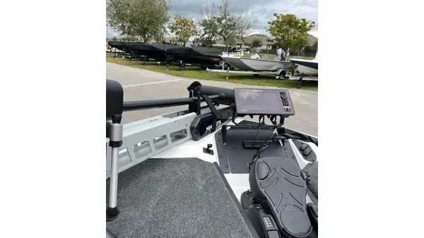 Slide: The Image of The image shows the deck of a Skeeter ZXR21 SE boat with a modern navigation system. - 6