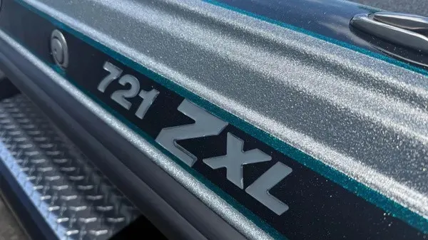 Slide: The Image of Close-up of the Phoenix 721 ZXL with a shimmering finish and textured metal flooring. - 9