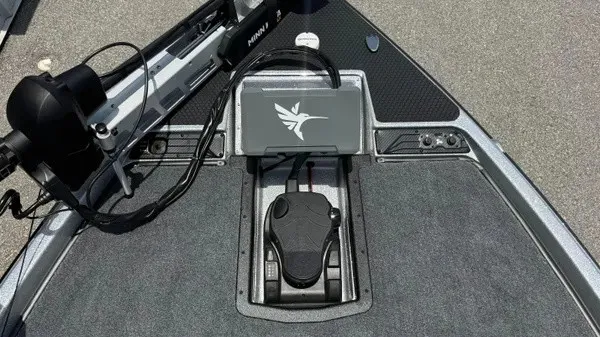 Slide: The Image of The image shows the deck of a Phoenix 721 ZXL boat with a control unit and a screen. - 19