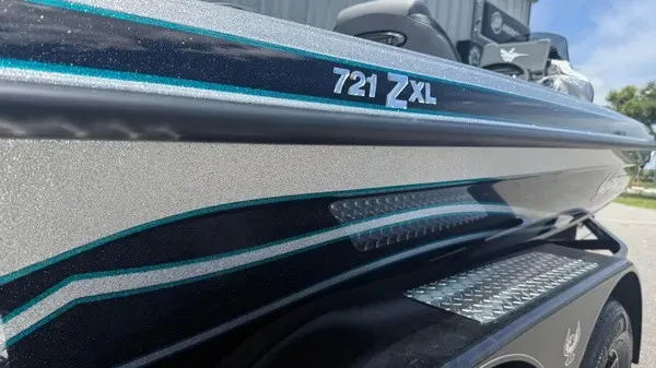 Slide: The Image of Close-up of the 2027 Phoenix 721 ZXL with a sleek finish and stylish accents. - 4