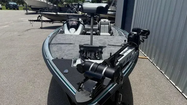 Slide: The Image of Phoenix 721 ZXL 2027: Fishing boat with gray deck, trolling motor, and seat, on a trailer. - 14