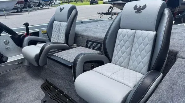 Slide: The Image of Two luxurious, padded seats with quilted pattern in a modern boat. - 12