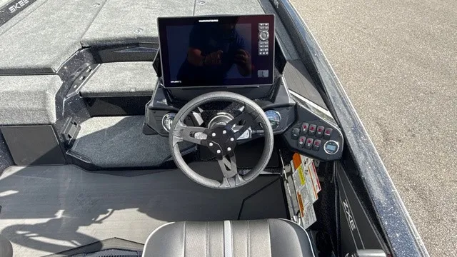 Slide: The Image of The image shows the cockpit of a 2027 Skeeter ZXE20 boat with a modern helm station. - 11