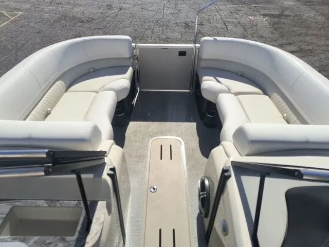 Slide: The Image of The image shows the interior of a 2027 Avalon Excalibur LTD Twin SS 25 FT with sleek, light seating. - 14