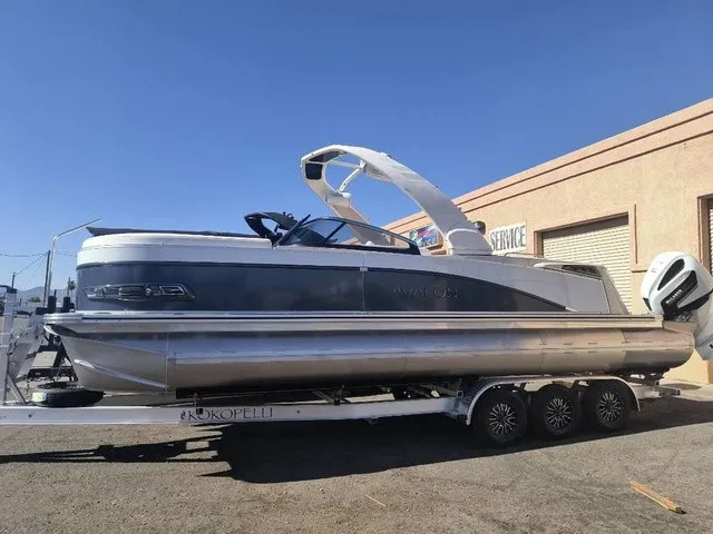 The Image of 2027 Avalon Excalibur LTD Twin SS 25 FT on a trailer. - 1