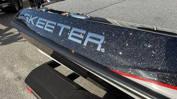 Slide: The Image of Close-up of a Skeeter ZXE20 boat's shiny stern with sparkling paint. - 3