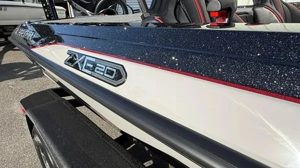 Slide: The Image of The image shows a sleek boat with "ZXE20" written on the side. - 2