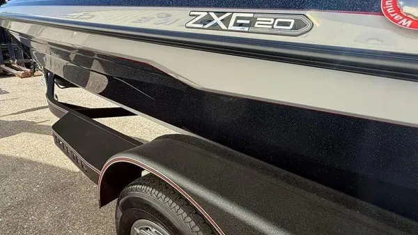 Slide: The Image of Close-up of a 2026 Skeeter ZXE20 boat on a trailer. - 9