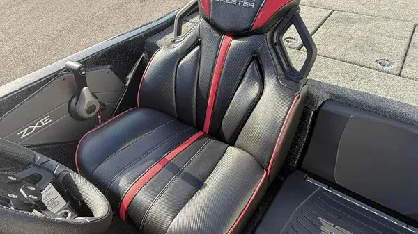 Slide: The Image of The 2026 Skeeter ZXE20 features a modern seat with black and red upholstery design. - 19