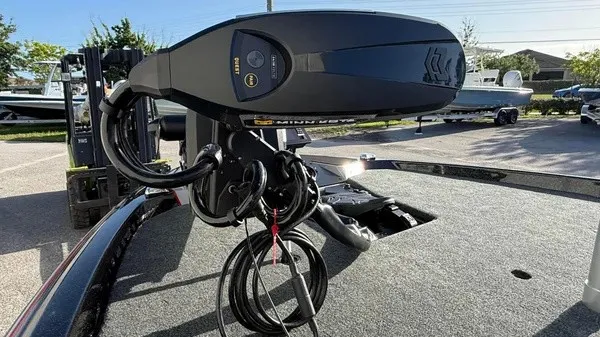 Slide: The Image of A modern boat with an advanced motor module on the deck, surrounded by other boats. - 10
