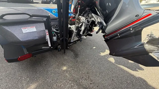 Slide: The Image of Close-up of the rear of a 2027 Skeeter ZXE21 boat with a Yamaha outboard motor. - 4