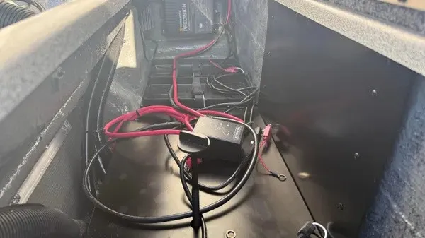 Slide: The Image of Interior view of a 2027 Phoenix 818 Pro with cables and electronics. - 21