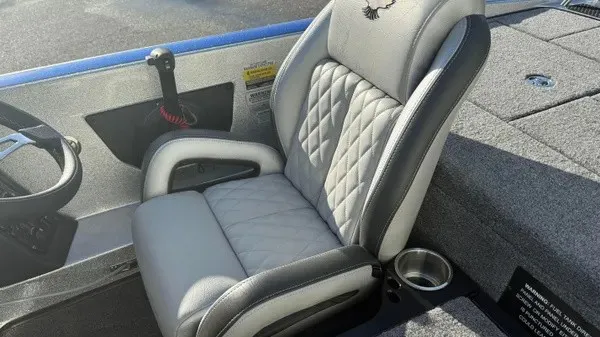 Slide: The Image of The 2027 Phoenix 818 Pro features a luxurious, quilted seat with diamond pattern and a cup holder. - 15