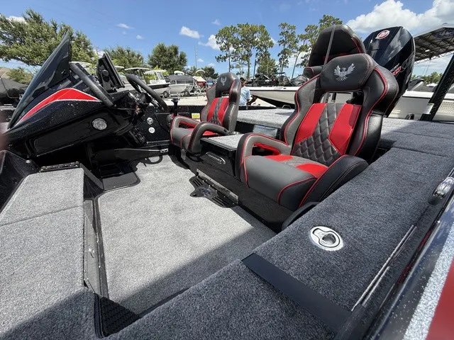 Slide: The Image of The image shows the cockpit of a 2027 Phoenix 920 Elite X II with two sporty seats. - 8
