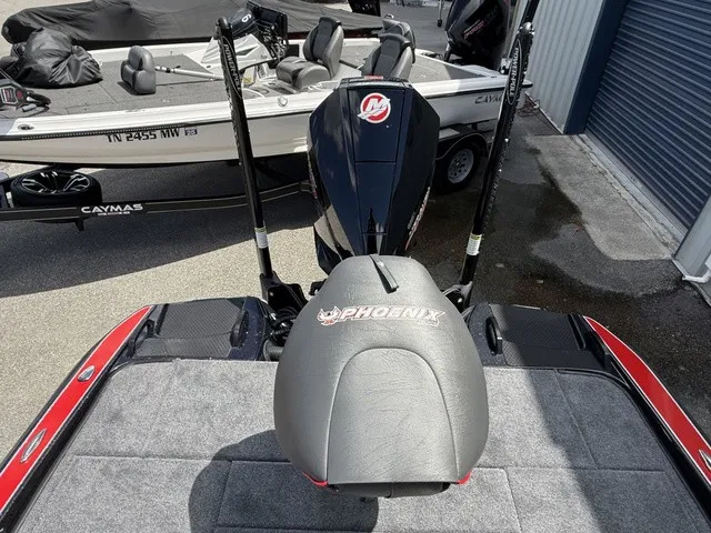 Slide: The Image of Rear view of a 2027 Phoenix 920 Elite X II with motor and seat. - 15