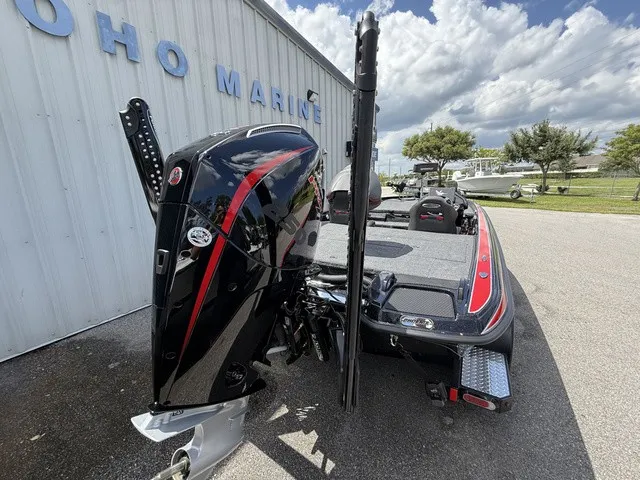 Slide: The Image of The image shows a 2027 Phoenix 920 Elite X II boat with a powerful outboard motor. - 4