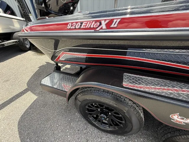 Slide: The Image of Close-up of a Phoenix 920 Elite X II boat with sleek design and distinctive graphics. - 3