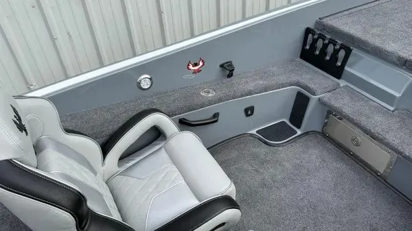 Slide: The Image of Interior of a 2027 Phoenix 920 Elite X with gray upholstery and a comfortable seat. - 20