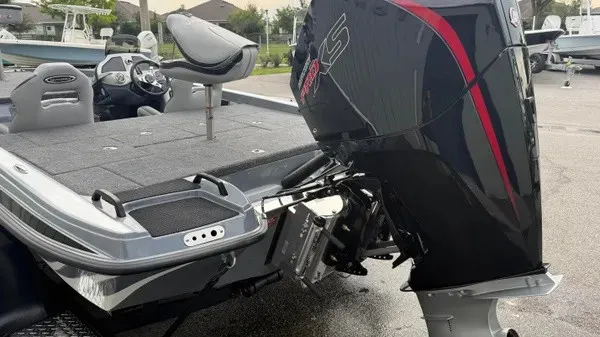 Slide: The Image of The image shows a 2027 Phoenix 920 Elite X boat with a powerful outboard motor. - 6