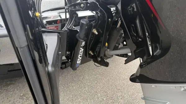 Slide: The Image of Close-up of a boat's outboard motor with hydraulic lift system. - 6