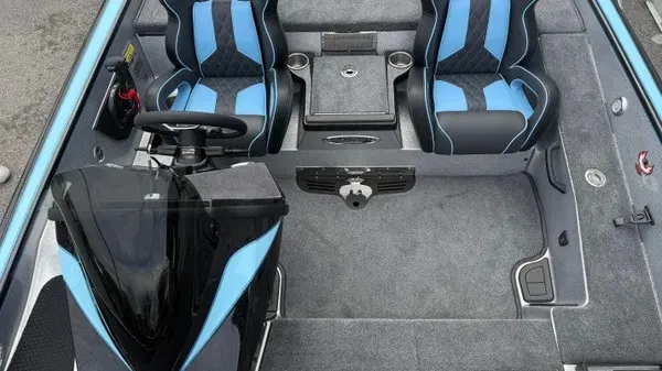 Slide: The Image of The image shows the cockpit of a 2026 Phoenix 20 XE boat with two blue seats. - 10