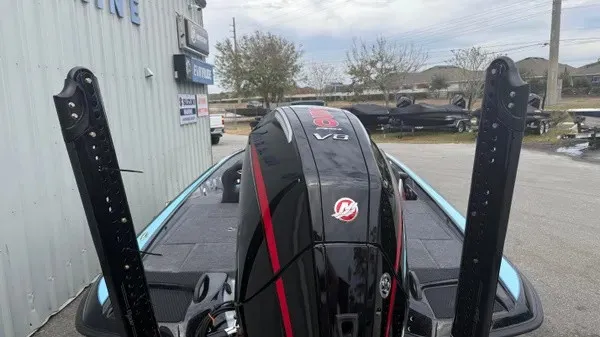 Slide: The Image of Rear view of a 2026 Phoenix 20 XE boat with a powerful outboard motor. - 5