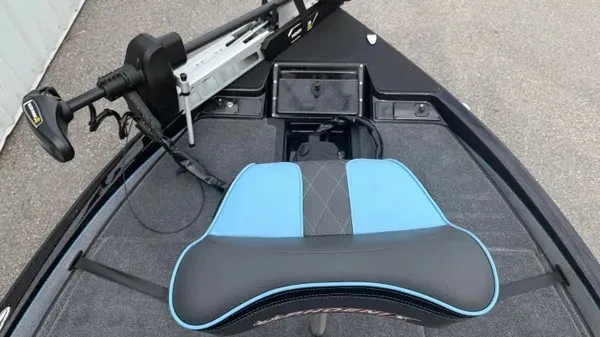 Slide: The Image of The image shows the bow of a 2026 Phoenix 20 XE boat with a blue and black seat. - 9