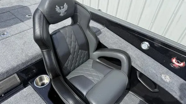Slide: The Image of The 2027 Phoenix 921 Elite X features a luxurious, padded seat with a quilted pattern. - 17