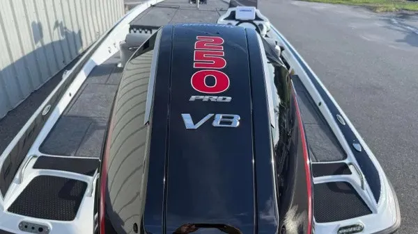 Slide: The Image of The image shows the rear of a Phoenix 721 ZXL boat with a powerful outboard motor. - 25