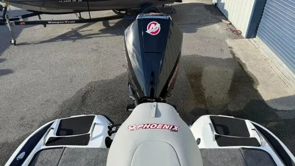 Slide: The Image of Rear view of a Phoenix 721 ZXL boat with engine. - 20