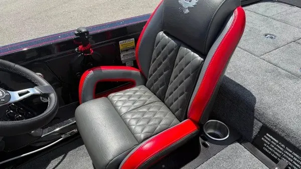 Slide: The Image of The 2027 Phoenix 919 ZXL features a luxurious seat with black and red leather. - 20
