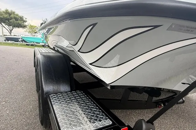 Slide: The Image of Close-up of a 2027 Phoenix 921 Elite X II hull with stylish design. - 6
