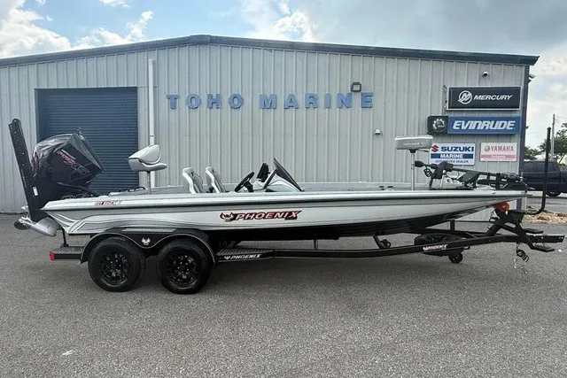 The Image of A 2027 Phoenix 921 Elite X II on a trailer in front of a building. - 1