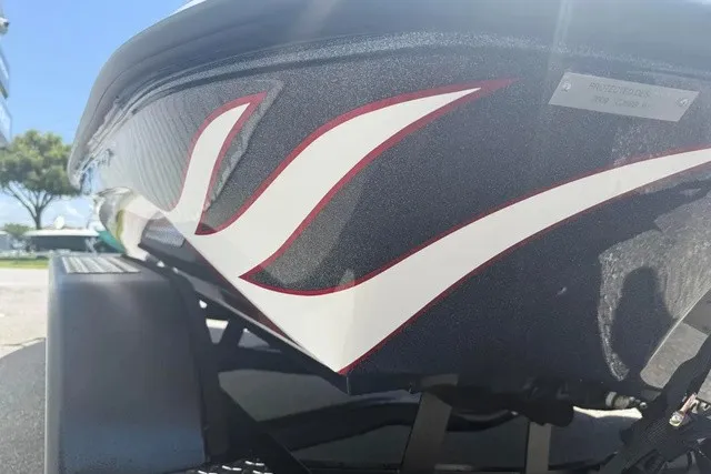 Slide: The Image of Close-up of a Phoenix 819 ZXL boat hull with a wavy design. - 7