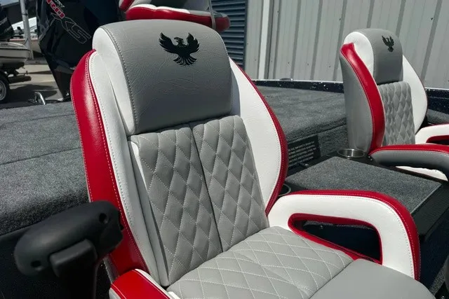 Slide: The Image of The 2027 Phoenix 819 ZXL features luxurious seats with gray and red leather and quilted pattern. - 22