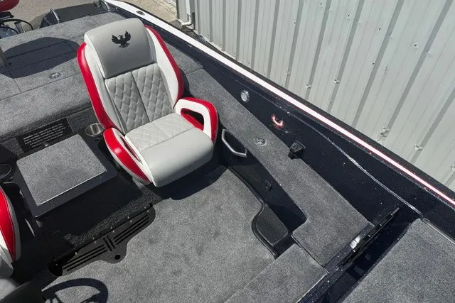 Slide: The Image of The image shows the cockpit of a 2027 Phoenix 819 ZXL boat with a cushioned seat. - 19