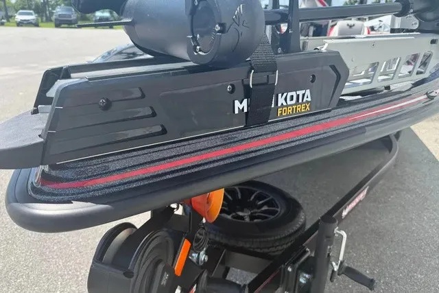 Slide: The Image of Close-up of a boat trailer with Minn Kota Fortrex motor. - 12
