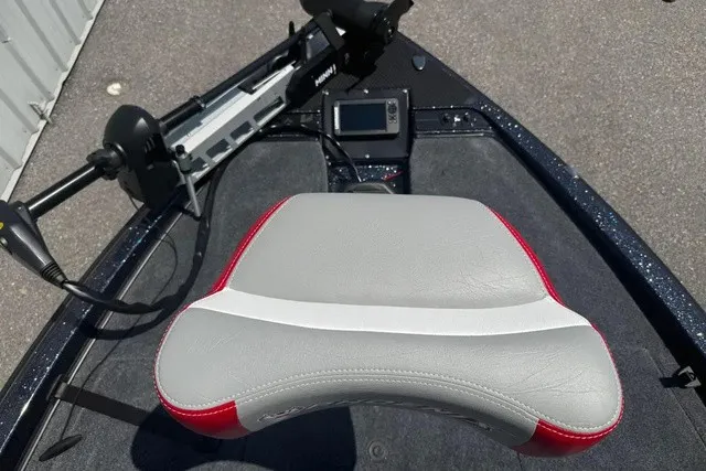 Slide: The Image of The image shows the seating area of a Phoenix 819 ZXL boat with gray and red upholstery. - 16